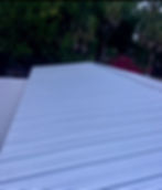 Standing seam galvalume roof installed on a residential home, showcasing sleek metal panels and durable weather-resistant finish.