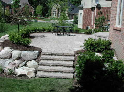 Raised brick patio in East Lansing, MI by All Terra Landscape Services
