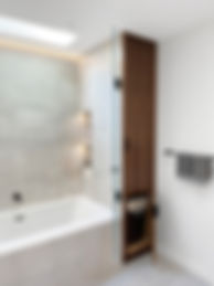 Modern bathroom interior design with hidden storage giving this a clean, sleek look and feel.
