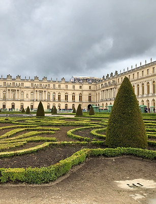 Palace of Versailles garden and building located in France.