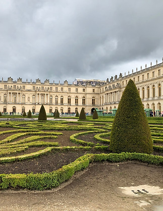 Palace of Versailles garden and building located in France.
