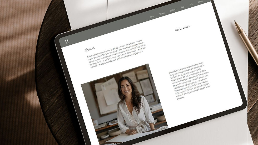 Laptop displaying the About Us page of an interior designer’s website, featured in a blog post about writing an About page that resonates with potential clients.