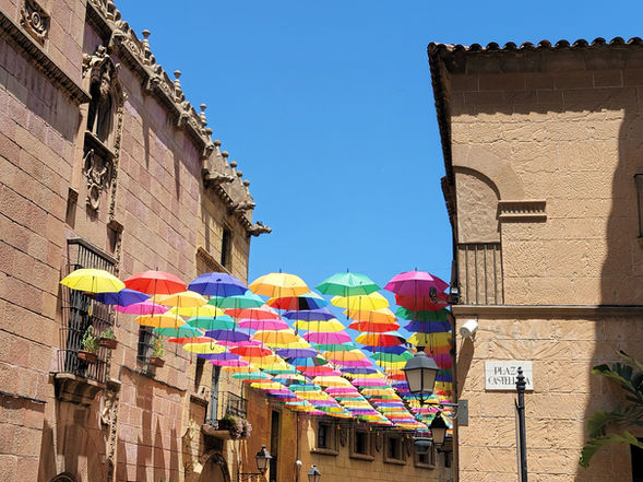 Umbrellas in alleyway in Barcelona, Spain.