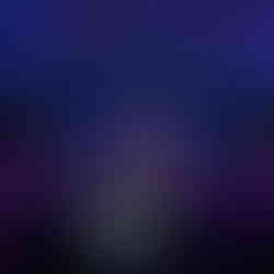 Escenario iluminado en cena de gala de congreso internacional – fotografía profesional de eventos corporativos