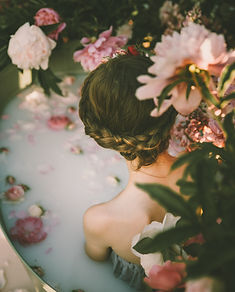 woman milk bath flowers anita-austvika.j