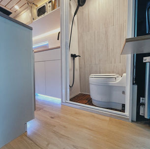 Bathroom / shower configuration of a campervan. The Laveo Dry-Flush toilet is a great solution for camper vans, since the toilet is removable and you do not have to worry about black water plumbing.