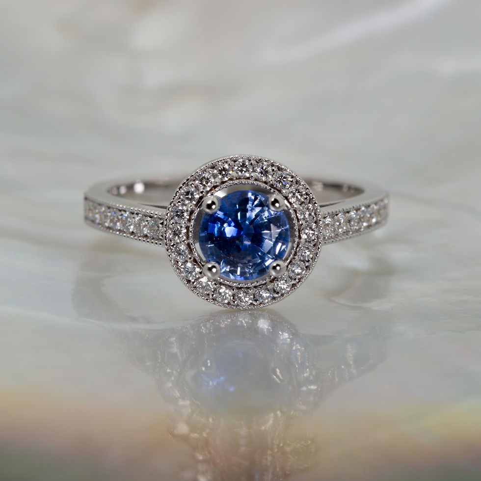 Blue Sapphire Ring with Diamond Halo