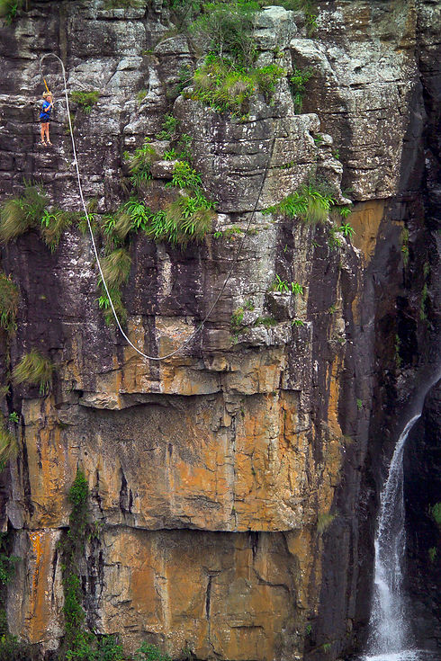 Gorge swing between cliffs in Zimbabwe - extreme sports adventure at high altitude
