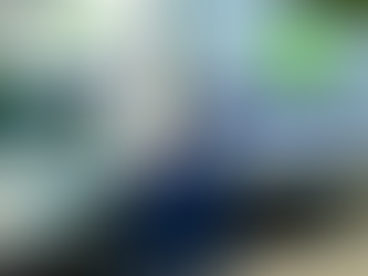 HAPPY LABOR movers standing outside of a box truck