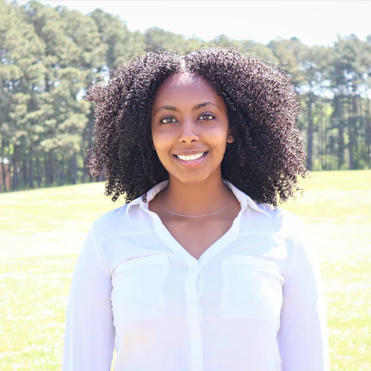 Image of Piniel Tadesse, CHES, Food Access Program Director. Piniel joined the Charlotte-Mecklenburg Food Policy Council in 2022. She has made many contributions to the Charlotte-Mecklenburg food system.
