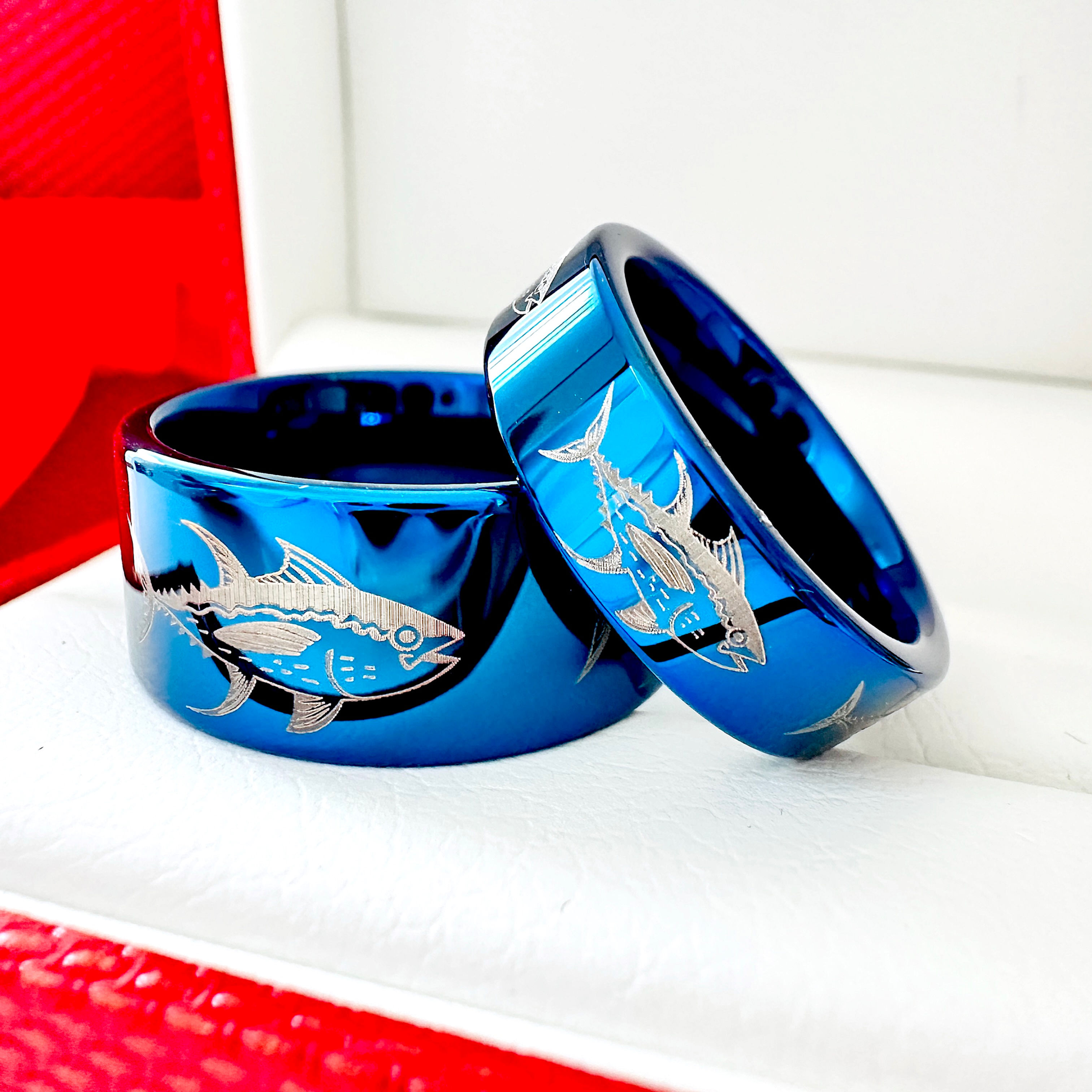 Blue tungsten men’s ring engraved with tuna fish design in 8mm or 10mm.