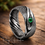 Thumbnail: Damascus steel men’s ring with genuine emerald stone, handcrafted wedding band, rustic and durable jewelry.