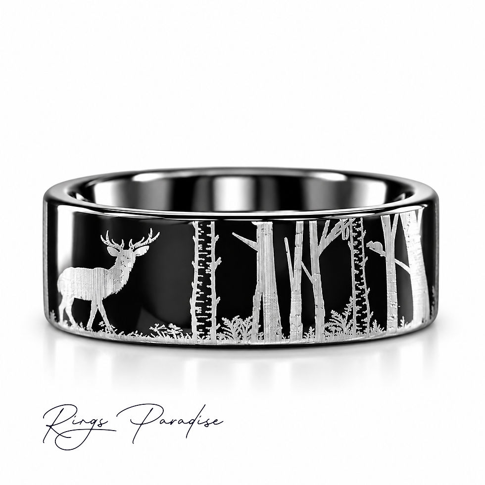 Black tungsten wedding band engraved with two elk and pine trees in a detailed silver-tone forest wildlife scene