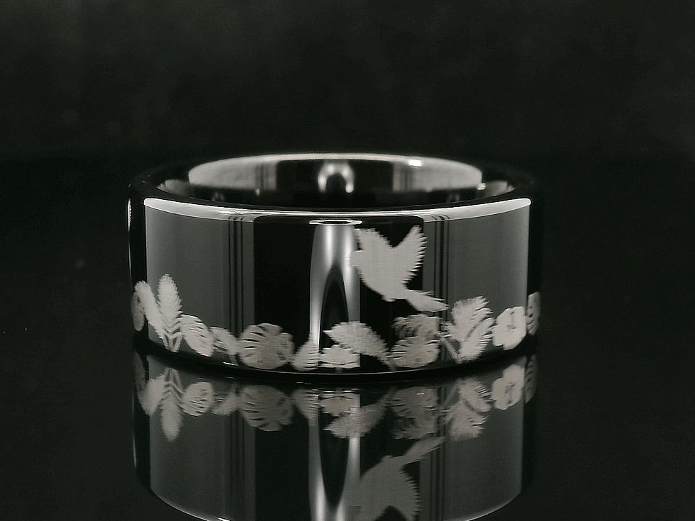 Thumbnail: black tungsten ring engraved with parrots and tropical leaves design