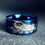 Thumbnail: Otters in River Pattern Engraved Blue Tungsten Ring, His and Her Promise Ring