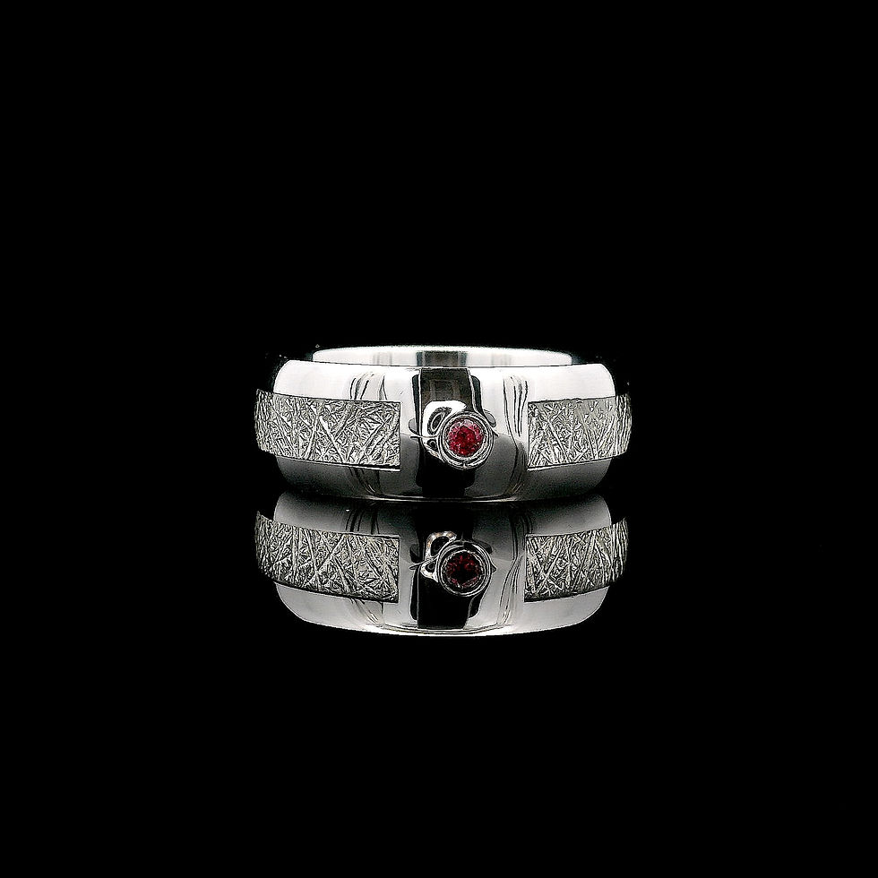 Thumbnail: Men’s meteorite ring with ruby stone in tungsten carbide finish, Women’s tungsten wedding band with ruby stone.