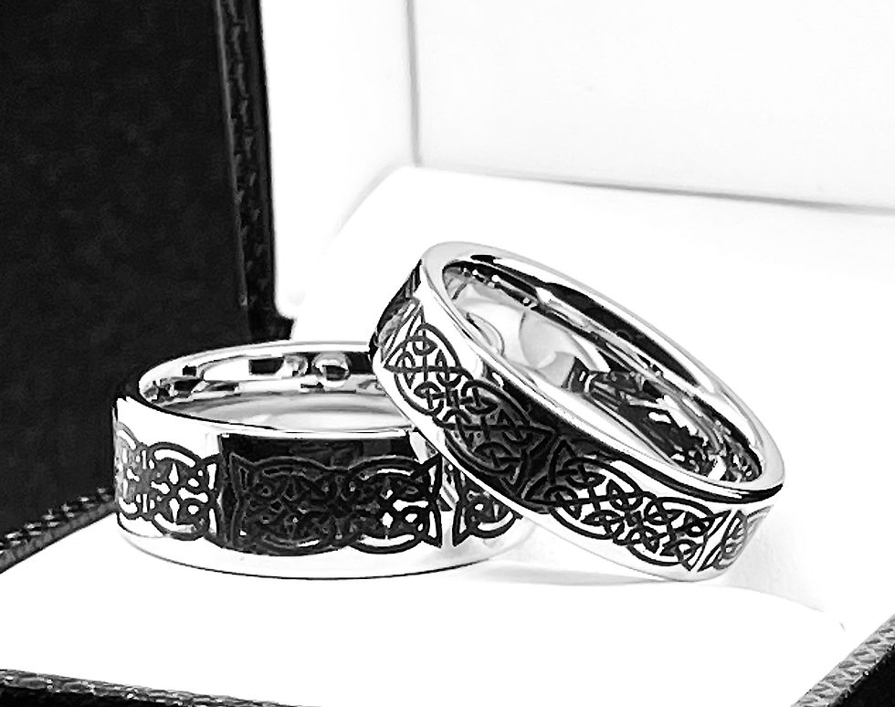 his and hers celtic knot tungsten wedding rings with engraved pattern