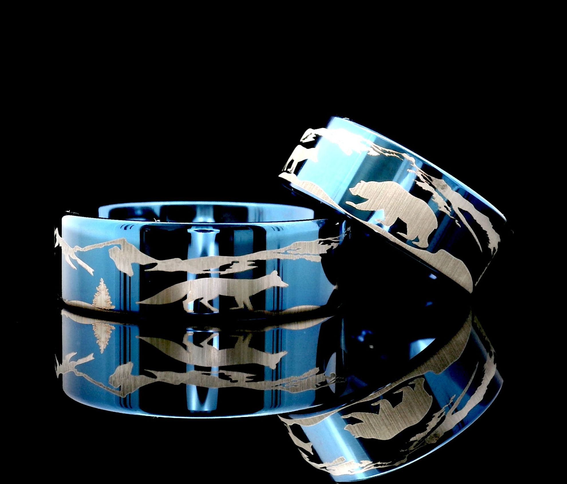 Men’s and women’s blue tungsten ring with a rustic bear and fox design.