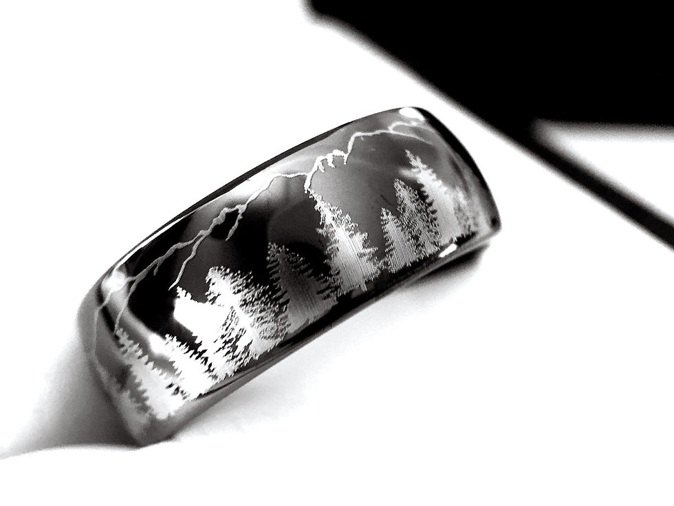 Thumbnail: Black Tungsten ring for both Men and Women, adorned with Pine Trees & Mountains