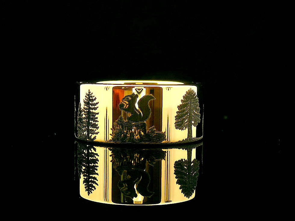 Thumbnail: Yellow gold tungsten wedding band with squirrel and forest engraving, designed for nature lovers.