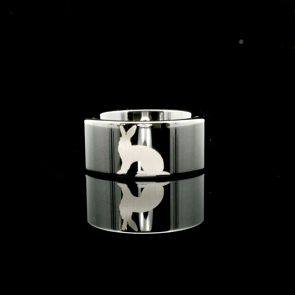 Thumbnail: Black tungsten carbide ring with laser-engraved bunny pattern, comfort fit band for men and women, animal-themed wedding