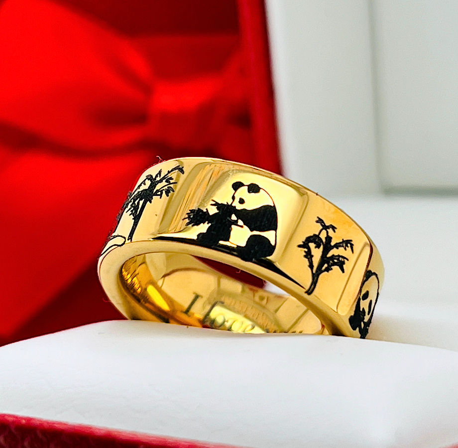 Thumbnail: Yellow gold tungsten ring engraved with a detailed panda pattern, 8mm comfort-fit band designed for panda jewelry lovers