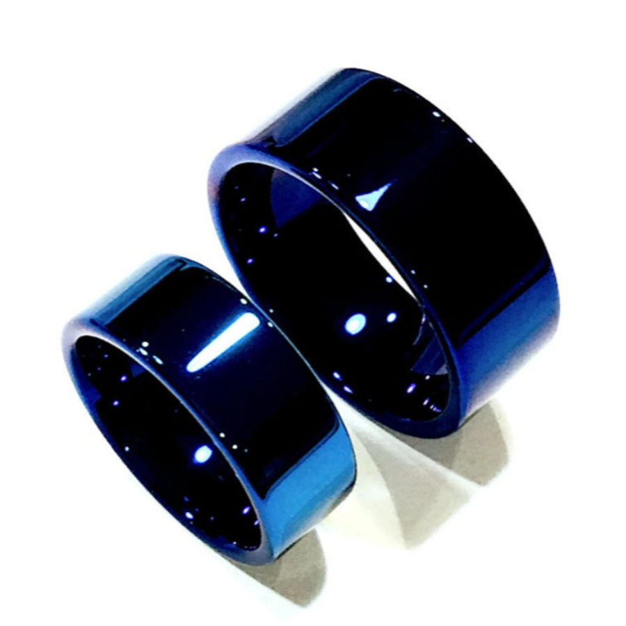 Thumbnail: blue tungsten wedding band with polished finish and comfort fit design