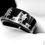 Thumbnail: Black tungsten wedding band engraved with a hunting scene, featuring a hunter, dogs, and elks.