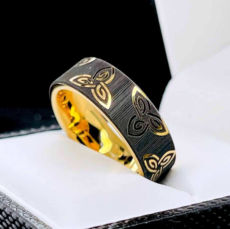 Thumbnail: yellow gold celtic knot tungsten ring with engraved pattern