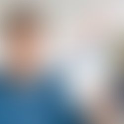 Man holding paycheck concerned about soaring costs