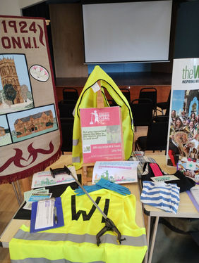 WI (Women's Institute) promoting the Spring Clean initiative at Long Sutton Spring Fair. 