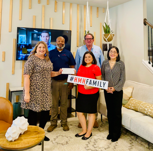 HISTORYMAKER HOMES PRESENTS CHECK TO SIENNA WOMEN'S LEAGUE