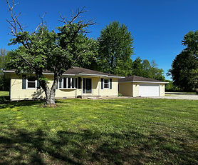 Meticulous home, detached garage and pole barns on 5 acres