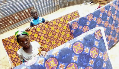 KCCA Distributes Matresses_edited.jpg