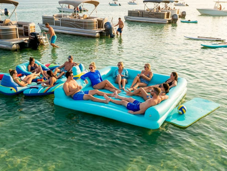 People floating on inflatables at Crab Island