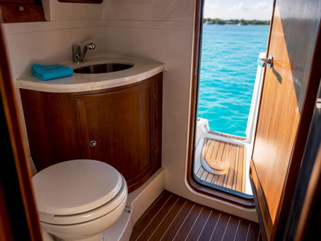 Compact marine restroom aboard tour boat