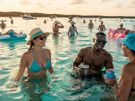 Visitors enjoying natural waters at Crab Island sandbar