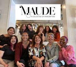 group of women seated after hair salon class
