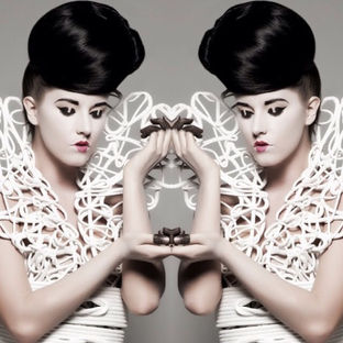 Doubled image black silky hair editorial hair style avant garde artistry by Francesca Rivetti