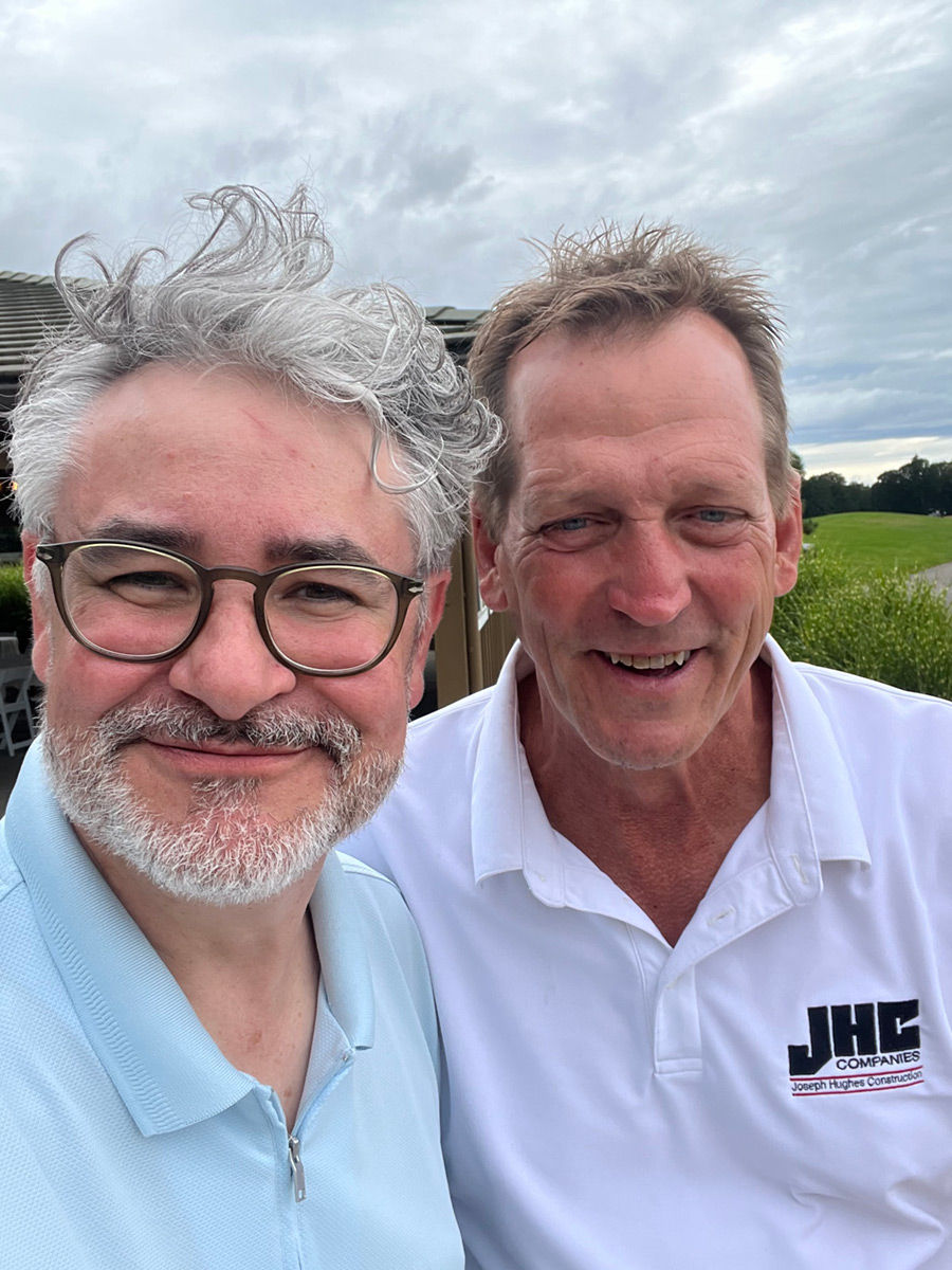 Photo of two men at CAB Golf Tournament