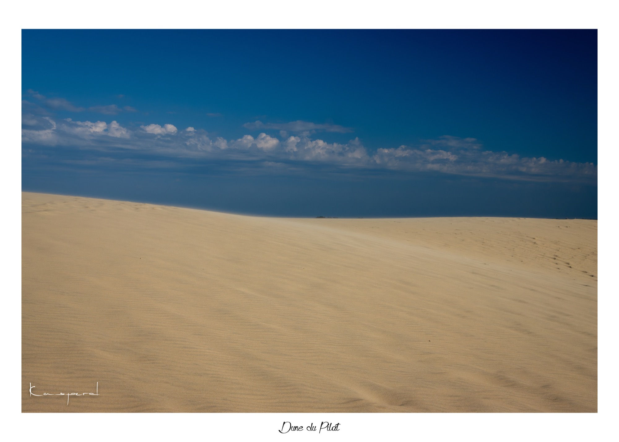 Léger vent qui soulève le sable doré de la Dune du Pilat