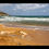 Miniature : Contraste entre le orange du sable et le bleu de la Méditerranée sur une plage de Gozo
