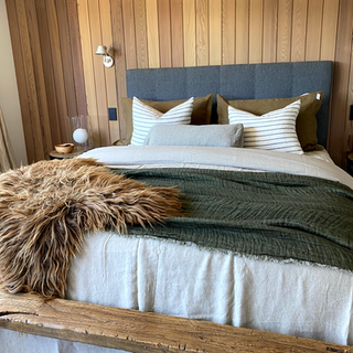cozy sheepskin on the bed
