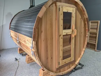 Copperwood 8ft Round Sauna angled front view showing roofing and chimney