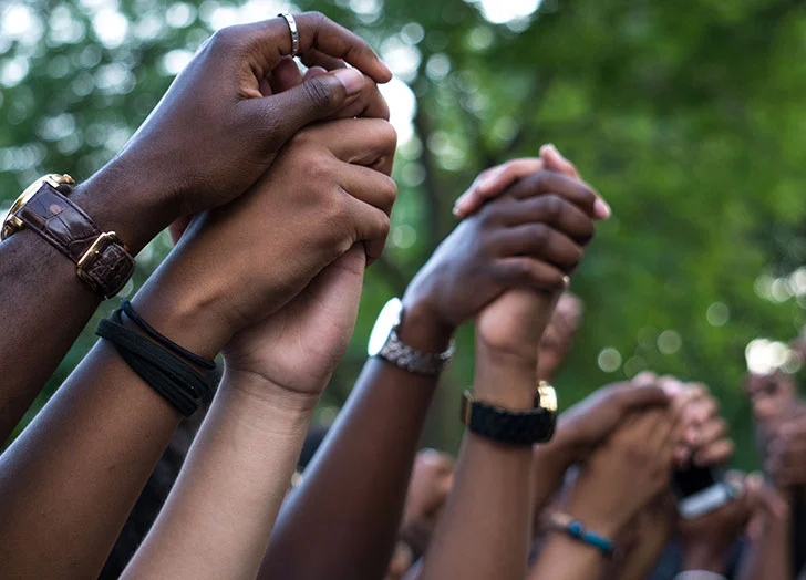 black hand holding.webp