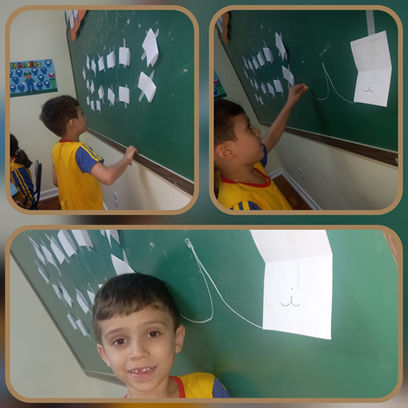 Descubra qual é a vogal escondida no post-it! 