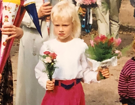 Meg Pfeiffer at age 7 when she started playing guitar