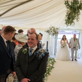That look says it all. Ben’s reaction as Amanda walks down the aisle at their Cornhill Castle wedding. 💍 A moment frozen in time by Biggar Picture Photography.