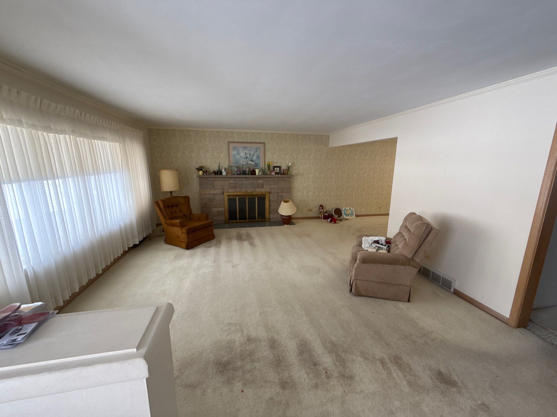 Before: living room with fireplace