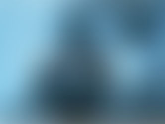 erson's reflection in rain-rippled water representing feedback as a mirror for self-awareness